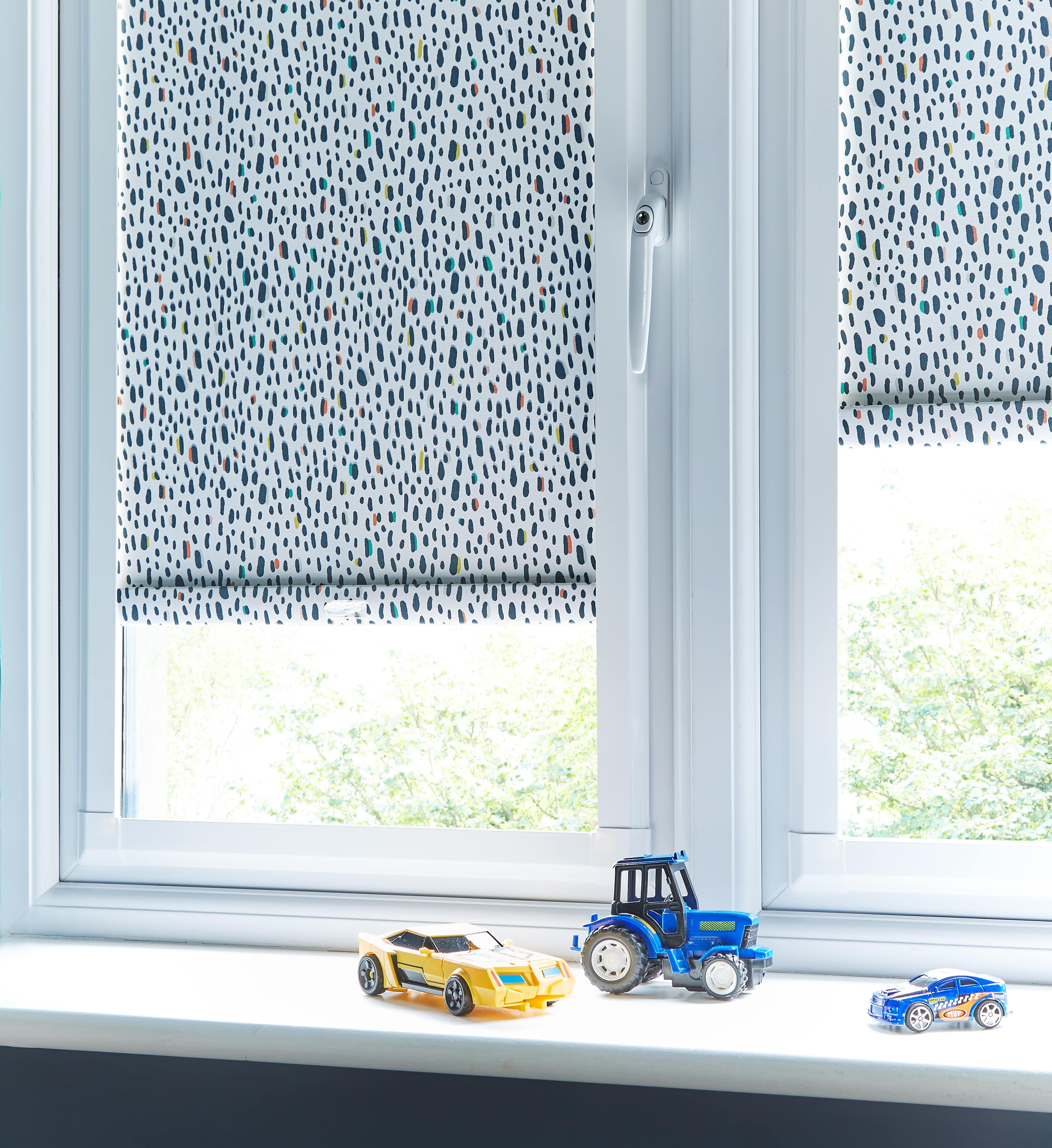 Perfect fit lenny navy roller blinds.